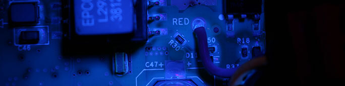 Conformal coating during the UV coating process